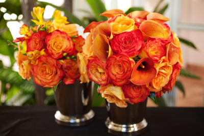 brides bouquet orange roses, orange mini calla lilies, freesia