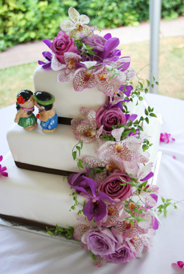 purple orchids on wedding cake