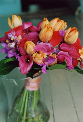 vibrant brides bouquet orange tulips, pink mini calla lilies