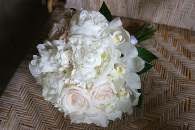 lush peonies with white orchids