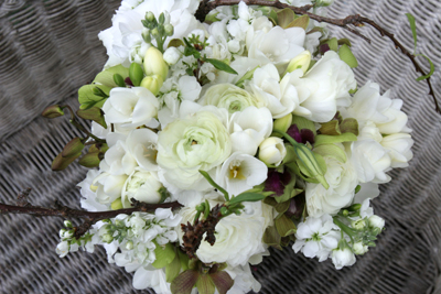 white bouquet with blossum branches