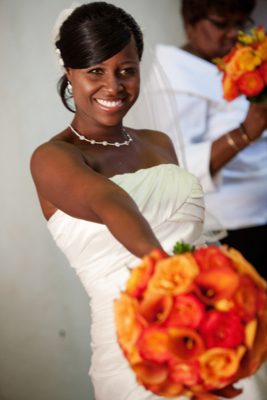 maui bride with orange bouquet